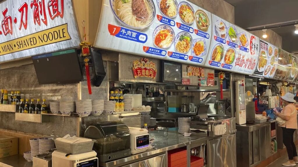 Open air hawker stall storefront of Shi Xiang Ge noodle specialist located at the top floor of the Bishan bus interchange coffee shop.