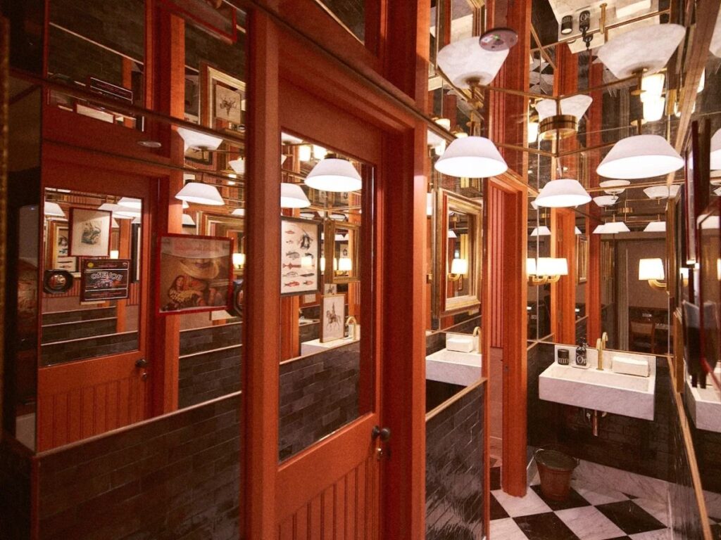 Best Tiong Bahru Cafes for Coffee, Brunch & Desserts (2026 Guide) 29 Casa Cicheti: A fresh thin-crust Salsiccia pizza and a plate of handmade pasta at Casa Cicheti Italian trattoria.