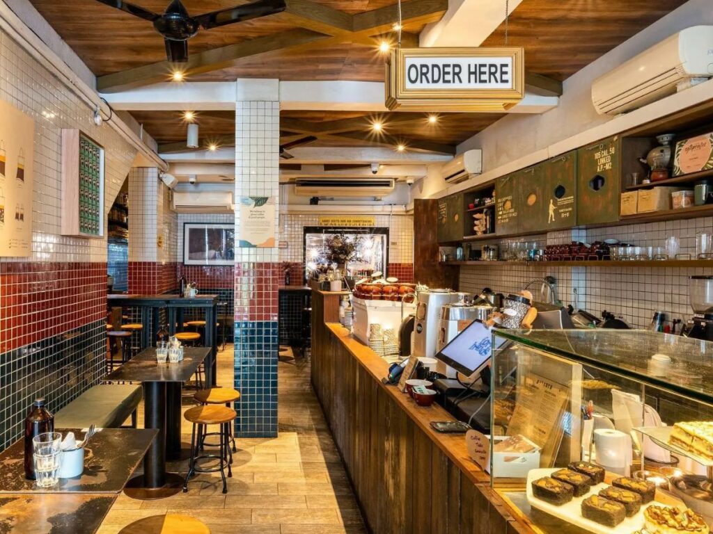 Best Tiong Bahru Cafes for Coffee, Brunch & Desserts (2026 Guide) 15 An archival exterior shot of the original Forty Hands specialty coffee shop at 78 Yong Siak Street.