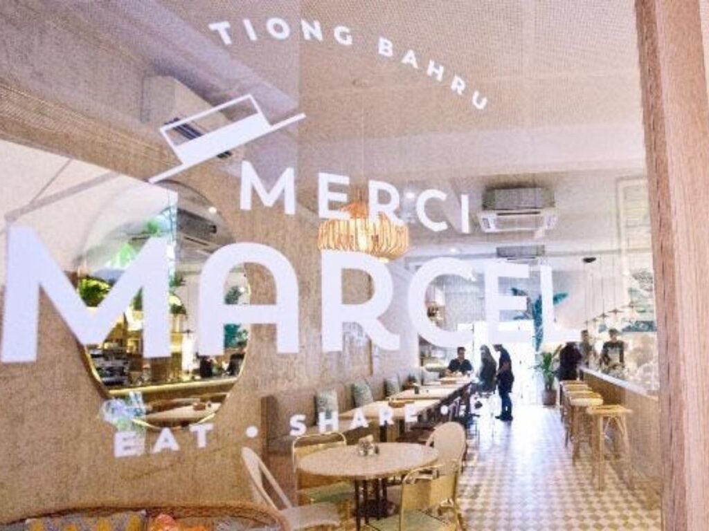 Best Tiong Bahru Cafes for Coffee, Brunch & Desserts (2026 Guide) 17 A delicate French Crêpe Marcel with tiramisu emulsion and fresh whipped cream served in a chic bistro setting.