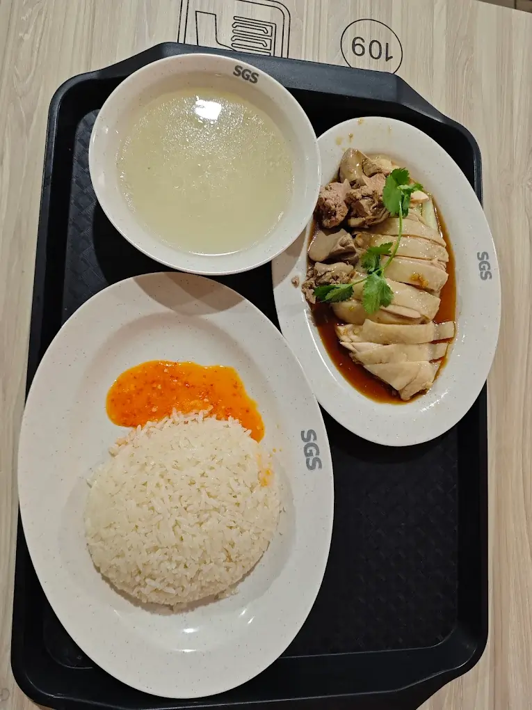 Jurong East Food: 20 Spots Worth The Queue 13 Platter of smooth-skinned poached chicken rice served at Xing Yun, a must-eat destination for local Jurong East food.