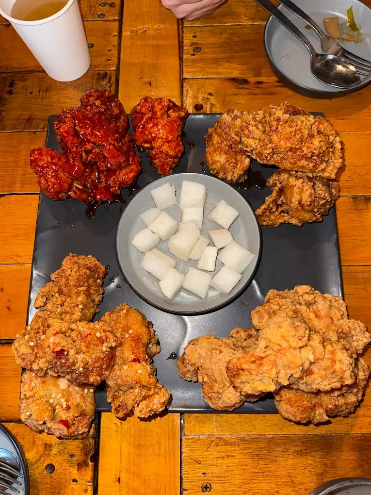 Jurong East Food: 20 Spots Worth The Queue 30 Fist-sized boneless Korean fried chicken pieces with a thick crunchy crust at Ahtti, a popular causal Jurong East food eatery.