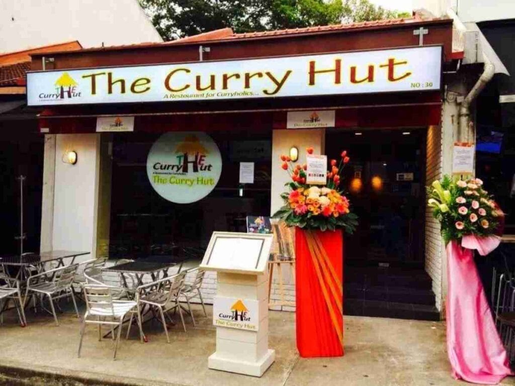 British Indian Curry Hut butter chicken naan and curry spread Holland Village Restaurants
