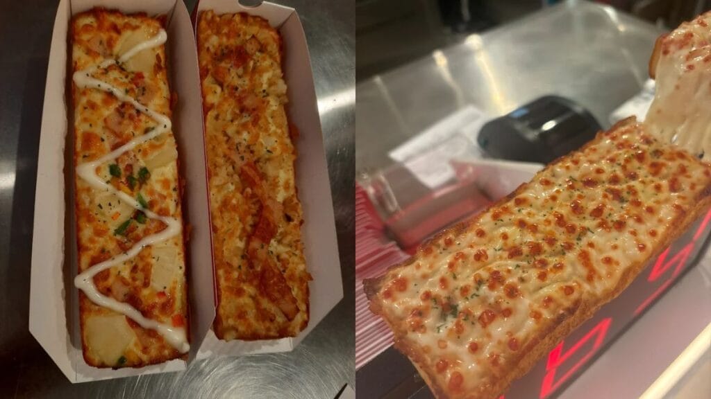 A quick, one-handed Potato Bacon Pizza from Eat Pizza, a fast Plaza Singapura food option.
