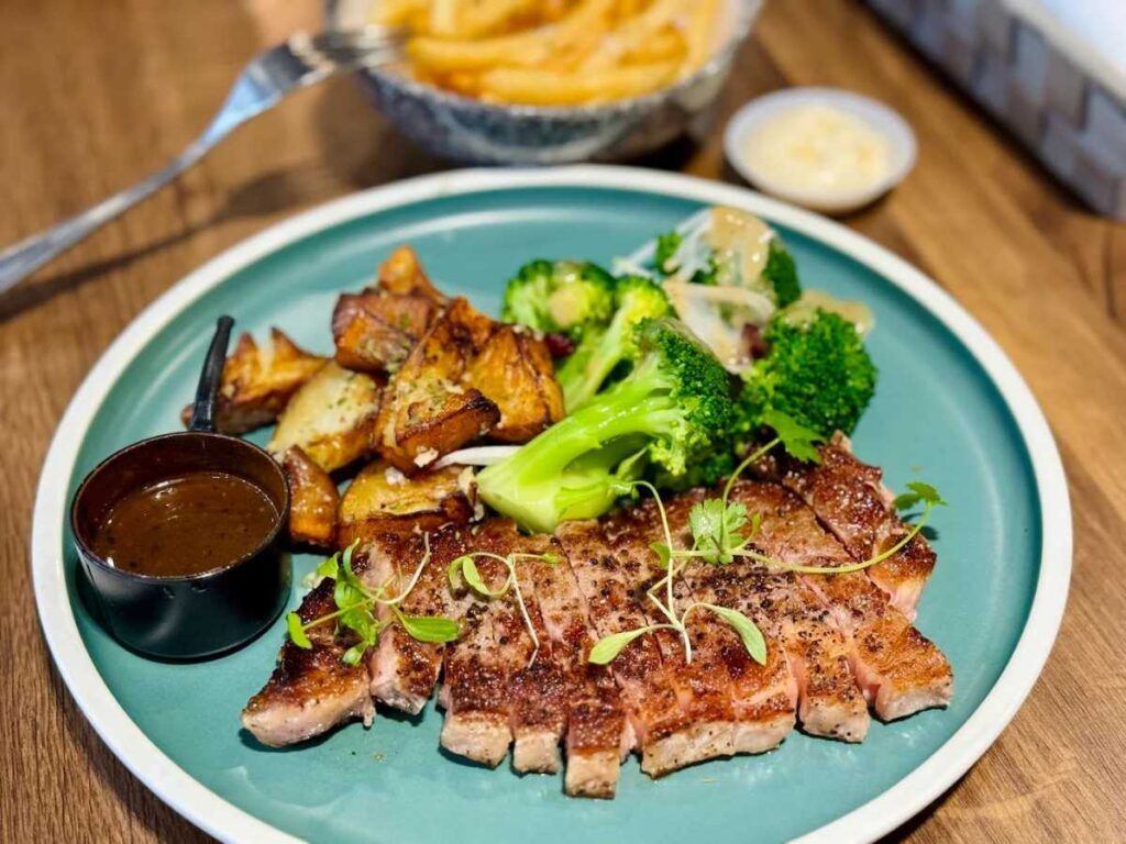 30+ Best Funan Food Places (2026): Halal, Cheap & Hidden Gems 14 5 Senses Bistro Western fusion dishes in cozy cafe setting – Best Funan Food Places