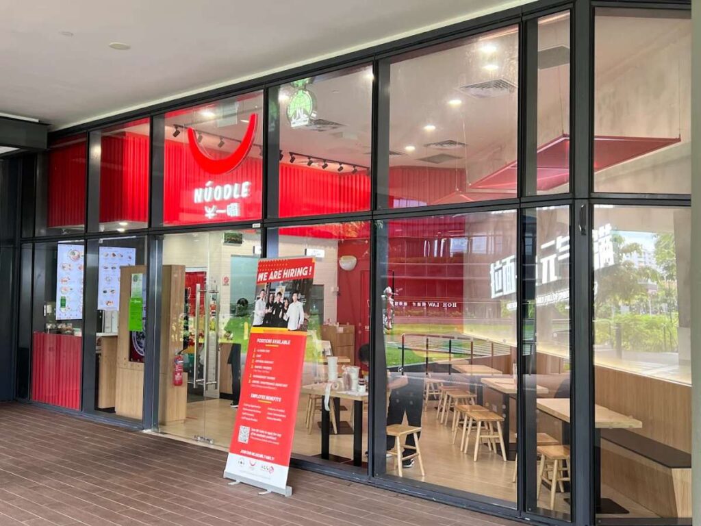 Woods Square Food Guide (2026): 20+ Best Restaurants & Halal Eats 5 Bowls of Asian noodle dishes from Nuodle in Woods Square.