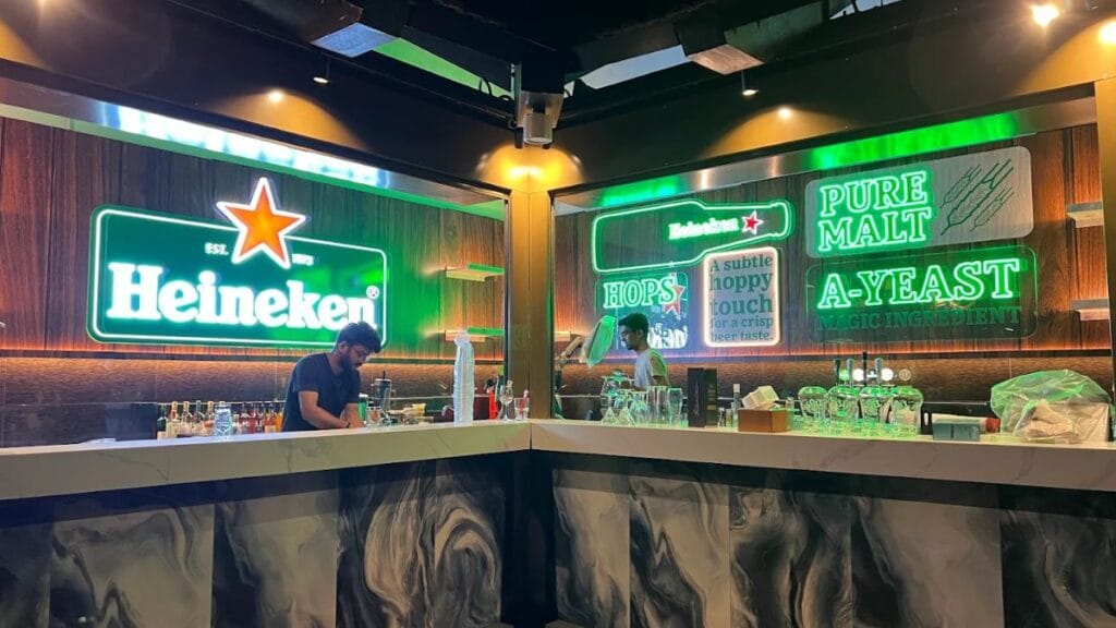 Best Dog Cafe Singapore: 26 Pet-Friendly Spots (2026) 20 A dog relaxing in the peaceful greenery of The Bark Cafe, an outdoor late-night dog friendly cafe singapore in Changi.