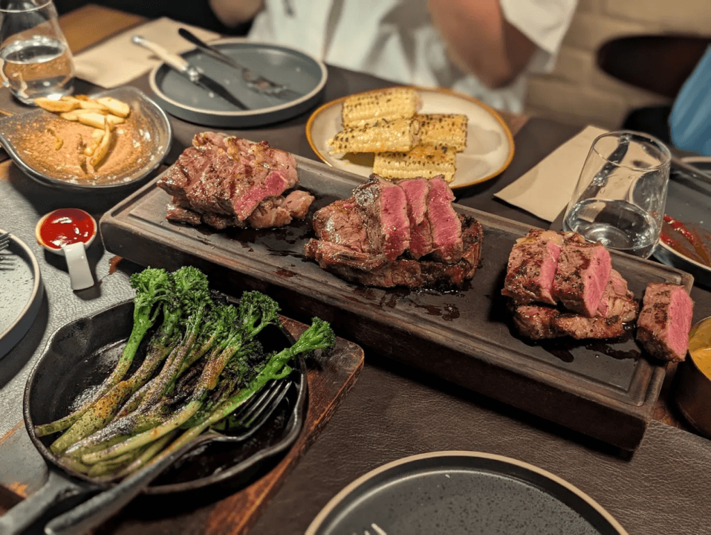 Premium dry-aged wood-fired steak with truffle fries at ASAP & Co, serving the best halal Telok Ayer food.